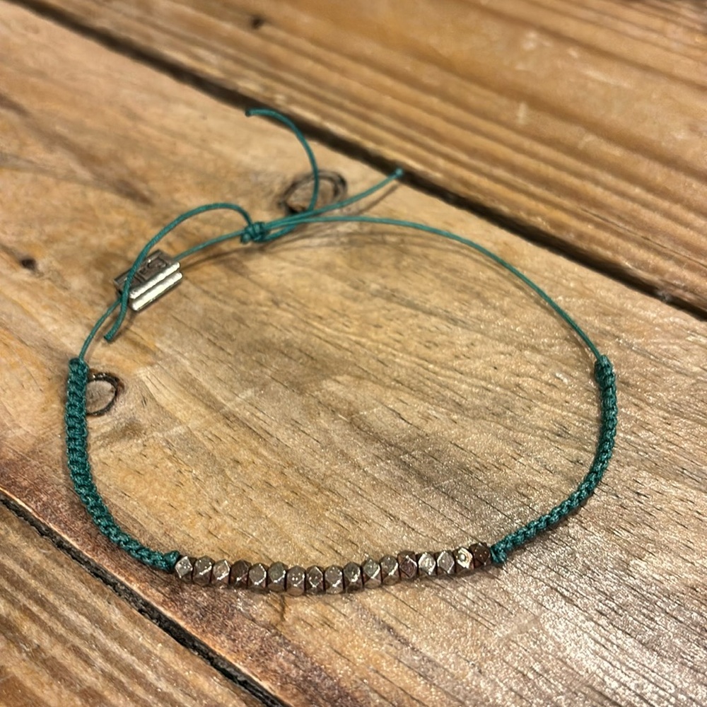 Balla green life karma bracelet with rose gold accent beads. Adjustable.